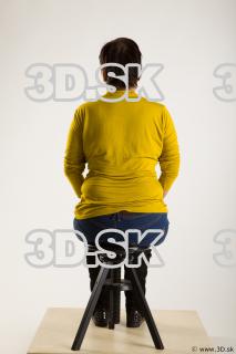 Sitting reference of yellow sweater blue jeans Gwendolyn 0003